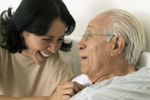 Caregiver with Smiling Man