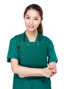 Chinese caregiver in green