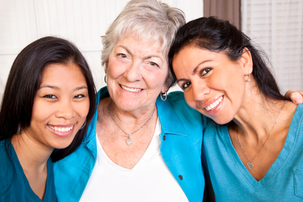 Senior caregivers with woman