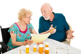Senior couple discussing options for health care