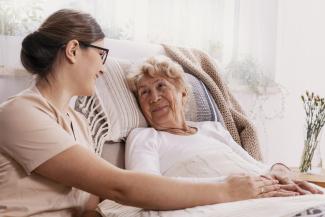 Elderly woman in retirement home
