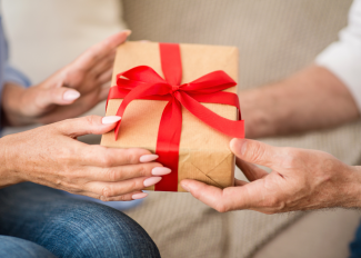 Giving a holiday gift to a senior family member
