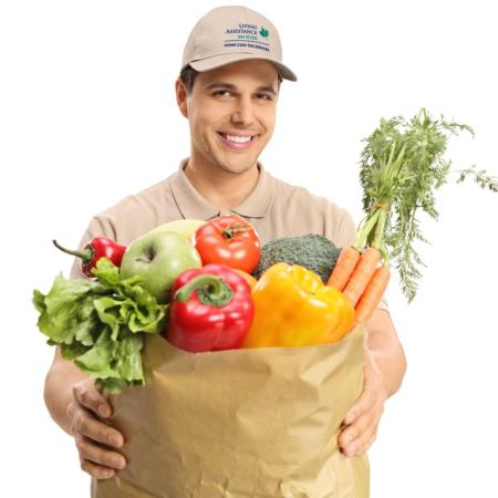 Young man with grocery delivery